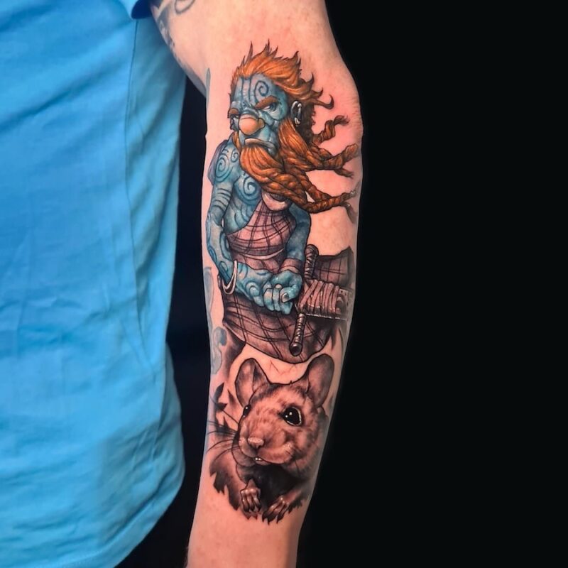 tattoo in kleur van trol op arm gezet door Dondersch